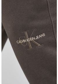 Calvin Klein Jeans - Spodnie. Kolor: zielony. Materiał: poliester, bawełna #4