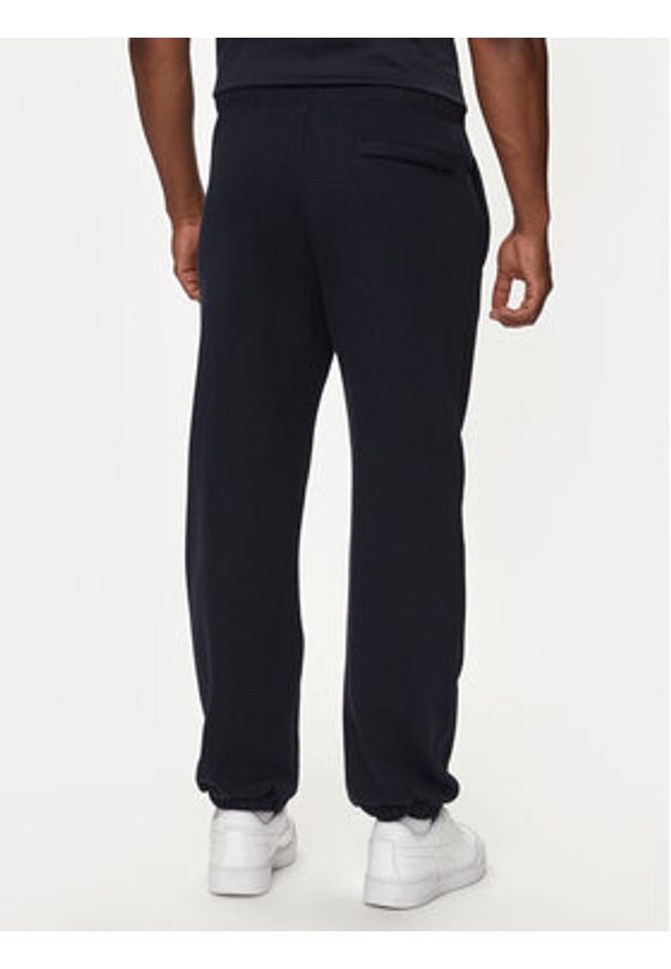 Guess Jeans Spodnie dresowe M4YB18 K9V31 Granatowy Regular Fit. Kolor: niebieski. Materiał: bawełna