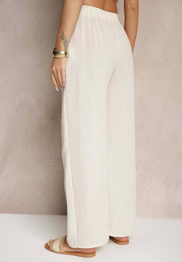 Renee - Jasnobeżowe Spodnie o Szerokim Kroju High Waist Edilisea. Okazja: na co dzień, na spotkanie biznesowe, do pracy. Stan: podwyższony. Kolor: beżowy. Styl: biznesowy, elegancki, casual