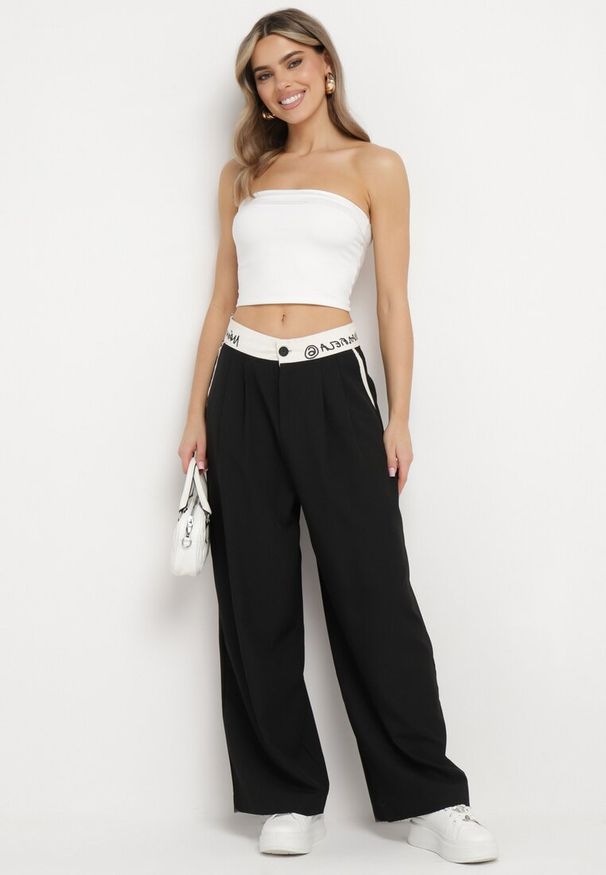 Born2be - Czarne Szerokie Palazzo Spodnie z Wysokim Stanem Zapinane na Zamek i Guziki Folina. Okazja: na spotkanie biznesowe, na co dzień. Stan: podwyższony. Kolekcja: plus size. Kolor: czarny. Materiał: bawełna. Styl: wizytowy, biznesowy, elegancki, casual