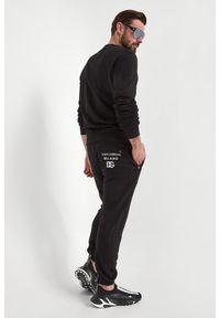 Dolce & Gabbana - Spodnie dresowe męskie DOLCE & GABBANA. Materiał: dresówka
