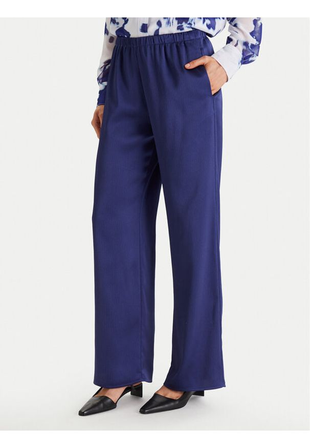 Calvin Klein Spodnie materiałowe LV044F611G Granatowy Regular Fit. Kolor: niebieski. Materiał: syntetyk