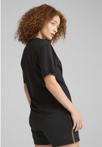 Puma - Damska koszulka o luźnym kroju Essentials ze zwierzęcym nadrukiem PUMA Black. Kolor: czarny. Materiał: guma. Wzór: nadruk, motyw zwierzęcy
