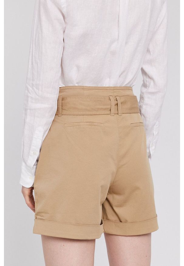 Calvin Klein - Szorty. Okazja: na co dzień. Kolor: beżowy. Materiał: tkanina. Wzór: gładki. Styl: casual