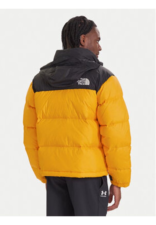 The North Face Kurtka puchowa 1996 Retro Nuptse NF0A3C8D Żółty Loose Fit. Kolor: żółty. Materiał: syntetyk. Styl: retro