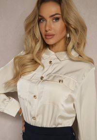 Renee - Granatowo-Beżowy Kombinezon z Koszulową Górą Zdobiony Wiązaniem i Eleganckimi Guzikami Eliti. Okazja: na spotkanie biznesowe. Kolor: niebieski. Długość rękawa: długi rękaw. Długość: długie. Wzór: aplikacja. Styl: elegancki #3
