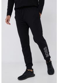 BOSS - Boss Spodnie piżamowe męskie kolor czarny z nadrukiem. Kolor: czarny. Materiał: bawełna. Wzór: nadruk #1