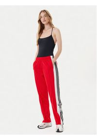 Adidas - adidas Spodnie dresowe Adibreak JY1354 Czerwony Loose Fit. Kolor: czerwony. Materiał: syntetyk