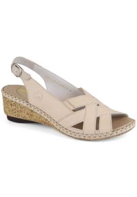 Skórzane komfortowe sandały damskie na koturnie beżowe Rieker 66189-60. Kolor: beżowy. Materiał: skóra. Obcas: na koturnie #1