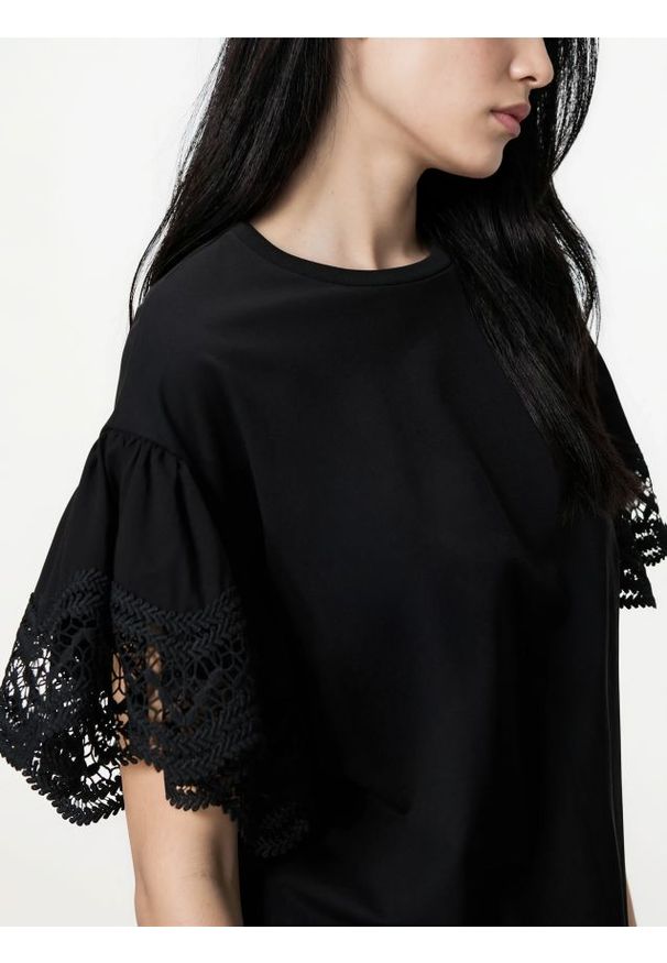 Reserved - Bluzka z ozdobnymi rękawami - czarny. Kolor: czarny. Materiał: bawełna, dzianina. Wzór: gładki