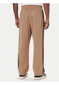Adidas - adidas Spodnie dresowe adicolor Firebird JY1419 Beżowy Baggy Fit. Kolor: beżowy. Materiał: syntetyk, bawełna #4
