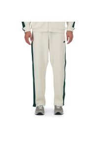Spodnie New Balance MP41504LIN - beżowe. Kolor: beżowy. Materiał: bawełna, dresówka #1