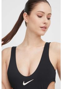 Nike jednoczęściowy strój kąpielowy Wild kolor czarny miękka miseczka. Kolor: czarny. Materiał: skóra, dzianina, materiał, włókno. Wzór: ze splotem #2