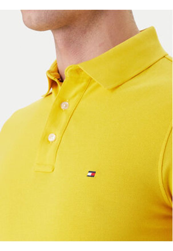 TOMMY HILFIGER - Tommy Hilfiger Polo 1985 MW0MW17771 Żółty Slim Fit. Typ kołnierza: polo. Kolor: żółty. Materiał: bawełna
