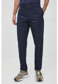 Armani Exchange spodnie bawełniane męskie kolor granatowy dopasowane. Kolor: niebieski. Materiał: bawełna