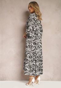 Renee - Czarno-Biała Sukienka Maxi z Falbanką z Guzikami i Liściastym Wzorem Polka. Kolor: czarny. Długość rękawa: długi rękaw. Styl: elegancki. Długość: maxi #4