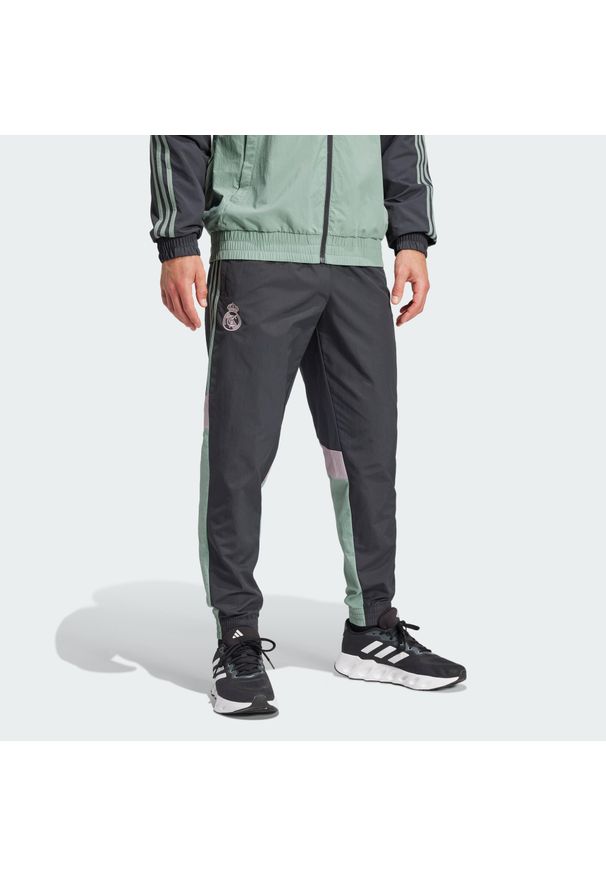 Adidas - Spodnie dresowe Real Madrid Seasonal. Kolor: szary. Materiał: dresówka. Wzór: aplikacja