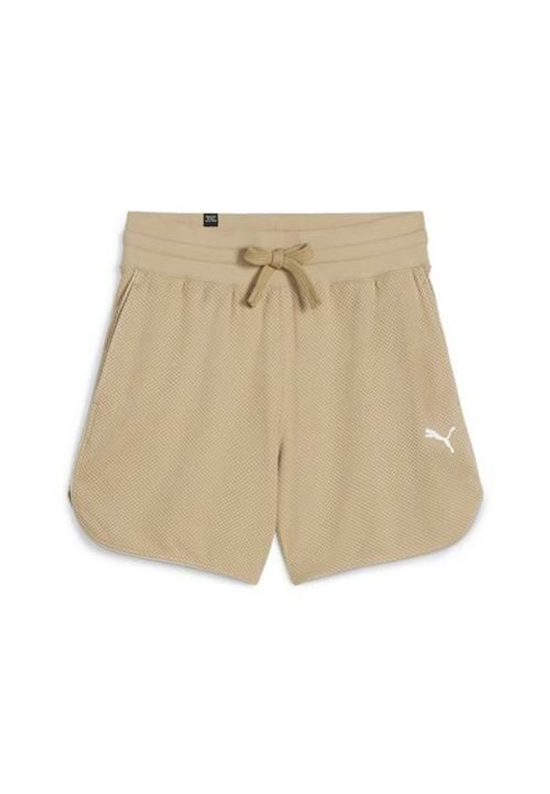 Spodnie sportowe damskie Puma 67870183. Kolor: beżowy. Długość: krótkie