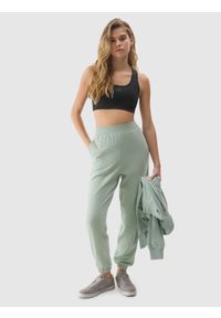 4f - Spodnie dresowe joggery z bawełną organiczną damskie - zielone. Kolor: zielony. Materiał: dresówka, bawełna. Wzór: gładki, ze splotem