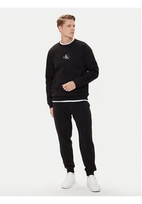 Calvin Klein Jeans Bluza Monologo J30J325630 Czarny Regular Fit. Kolor: czarny. Materiał: bawełna