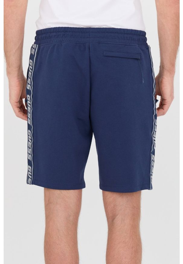 Guess - GUESS Granatowe shorty Arlo. Kolor: niebieski