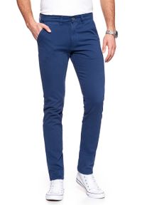 Wrangler - WRANGLER SPODNIE MĘSKIE CHINO BLUE DEPTHS W16LHB13Y. Materiał: materiał