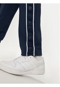 Ellesse Spodnie dresowe Inzagi SHX20959 Granatowy Regular Fit. Kolor: niebieski. Materiał: syntetyk #4