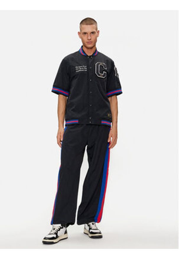 Champion Spodnie dresowe 220008 Czarny Custom Fit. Kolor: czarny. Materiał: syntetyk