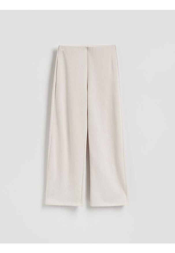 Reserved - Dzianinowe spodnie z bawełną - beżowy. Kolor: beżowy. Materiał: bawełna, dzianina