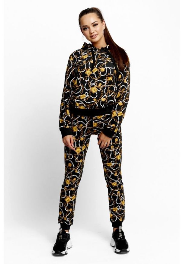 MOSCHINO Damskie spodnie dresowe w złote łańcuchy. Kolor: czarny. Materiał: dresówka