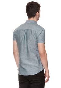 Wrangler - KOSZULA MĘSKA KRÓTKI RĘKAW WRANGLER S/S 1PKT SHIRT OCEAN TEAL W5916LPDP. Materiał: materiał. Długość rękawa: krótki rękaw. Długość: krótkie. Wzór: melanż #8