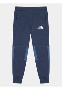 The North Face Spodnie dresowe Slacker NF0A82DS Granatowy Regular Fit. Kolor: niebieski. Materiał: bawełna #1