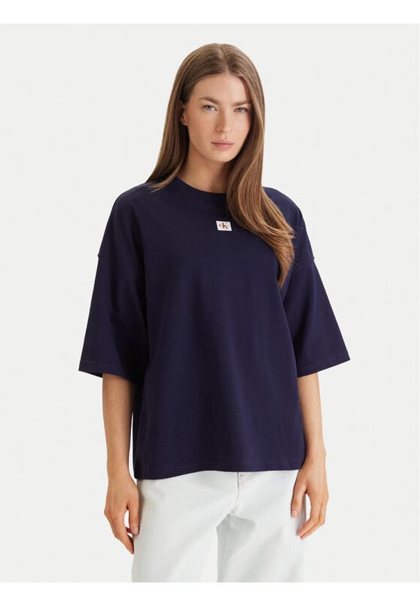 Calvin Klein Jeans T-Shirt LV047D204G Fioletowy Oversize. Kolor: fioletowy. Materiał: bawełna