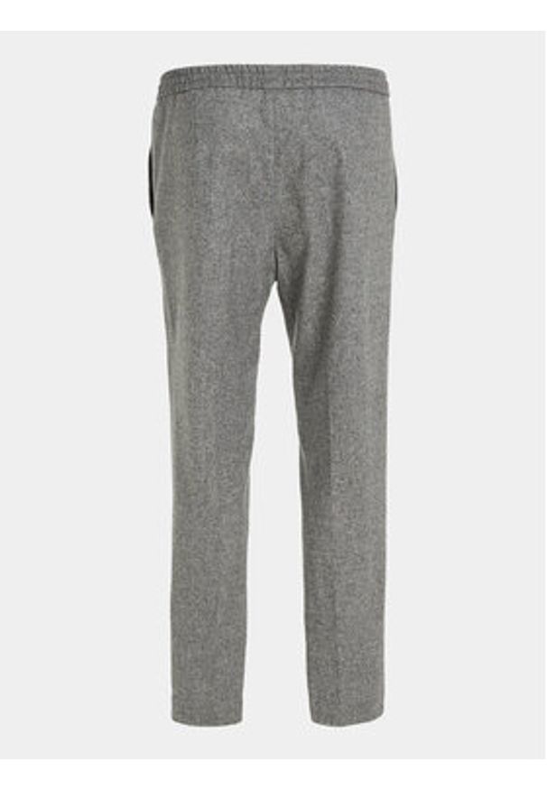 Calvin Klein Spodnie materiałowe K10K111713 Szary Tapered Fit. Kolor: szary. Materiał: syntetyk