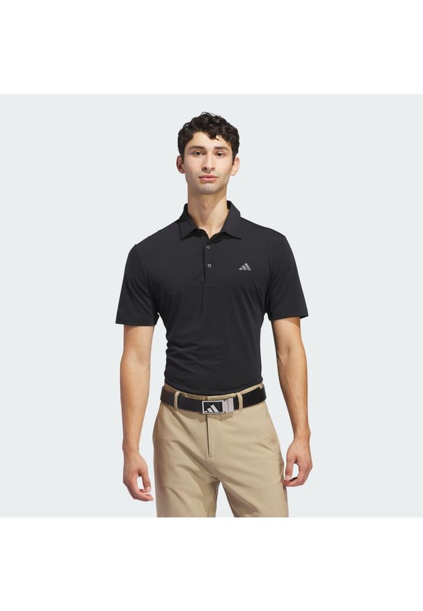Adidas - Koszulka polo Ultimate365 Solid. Typ kołnierza: polo. Kolor: czarny. Materiał: materiał. Styl: sportowy