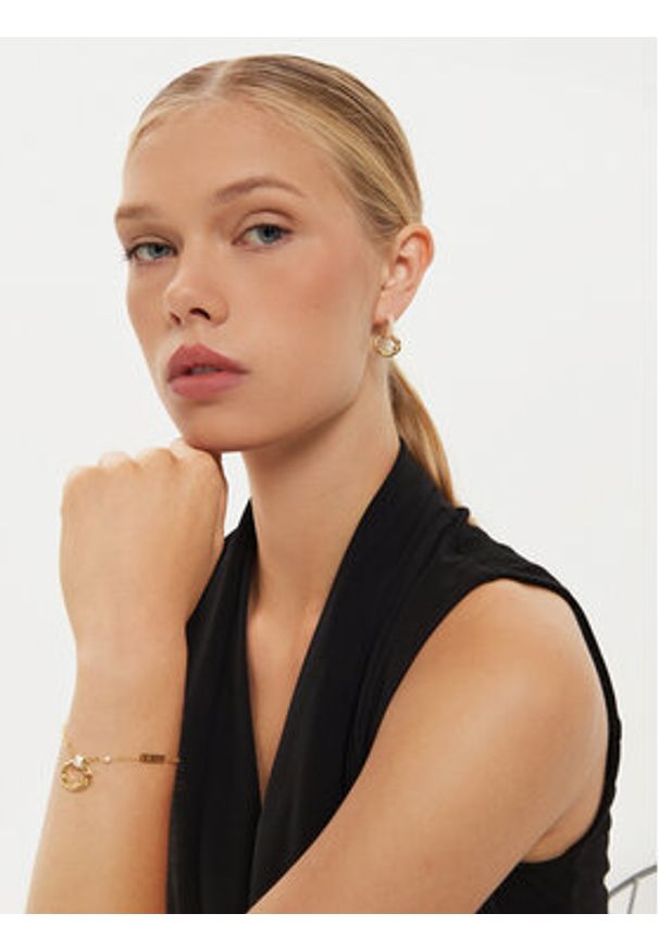 Guess Kolczyki JUBE04 521JW Złoty. Materiał: metalowe. Kolor: złoty