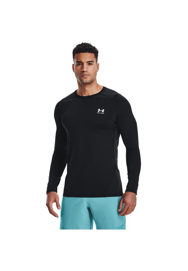 Bluza męskie Under Armour HeatGear Fitted Long Sleeve. Kolor: czarny. Materiał: poliester, materiał. Długość rękawa: długi rękaw. Sport: bieganie