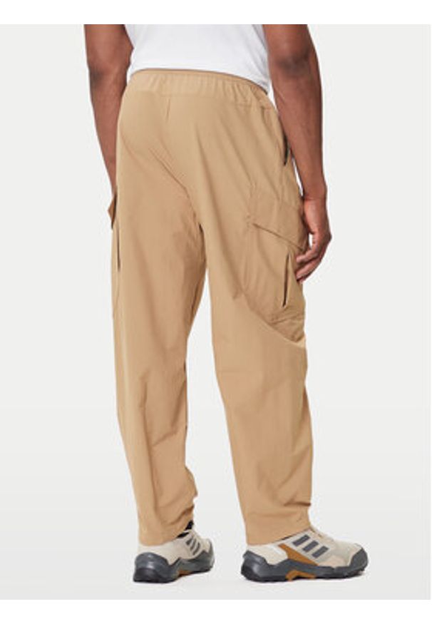 Adidas - adidas Spodnie outdoor Terrex Xploric JM7424 Beżowy Loose Fit. Kolor: beżowy. Materiał: syntetyk. Sport: outdoor