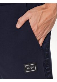 Hugo Spodnie dresowe 50485256 Granatowy Regular Fit. Kolor: niebieski. Materiał: bawełna, dresówka #4