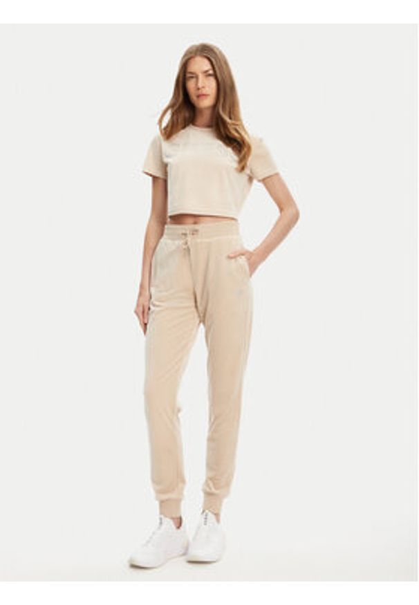 Guess Spodnie dresowe V3BB27 K0232 Beżowy Regular Fit. Kolor: beżowy. Materiał: syntetyk