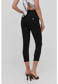 Guess spodnie damskie kolor czarny dopasowane medium waist. Kolor: czarny. Materiał: materiał #4