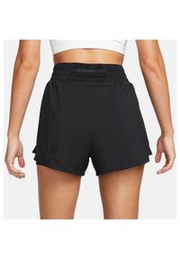 Spodnie treningowe damskie Nike DX6016. Kolor: czarny, wielokolorowy. Materiał: syntetyk, materiał. Długość: krótkie