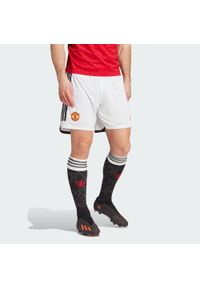 Adidas - Spodenki do piłki nożnej męskie Manchester United 23/24 Home. Kolor: biały. Materiał: materiał