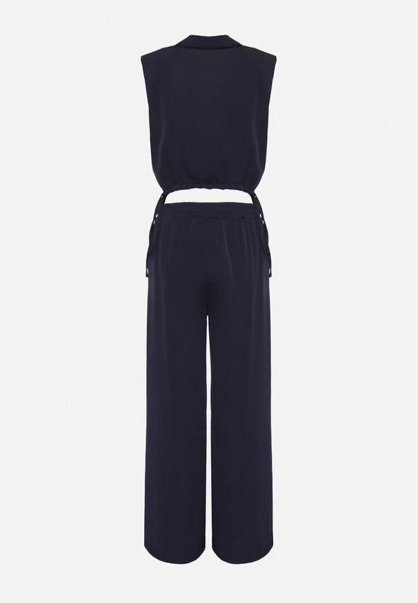 Born2be - Granatowy Komplet Kopertowa Bluzka z Kwiatową Broszką i Szerokie Spodnie Reavilia. Kolor: niebieski. Wzór: kwiaty