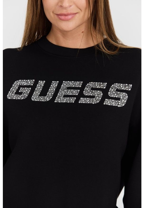 Guess - GUESS Czarna damska bluza z cyrkoniami Cecilia, Rozmiar M. Typ kołnierza: bez kaptura. Kolor: czarny. Materiał: wiskoza, elastan, poliamid, materiał. Długość rękawa: długi rękaw. Długość: długie. Wzór: aplikacja. Styl: elegancki