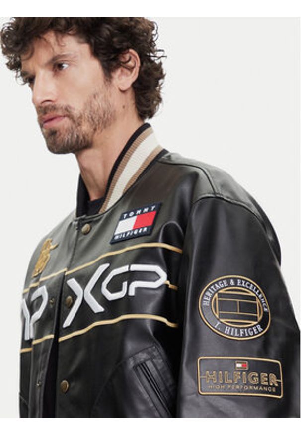 TOMMY HILFIGER - Tommy Hilfiger Kurtka z imitacji skóry F1 Movie Racing Varsity MW0MW41365 Czarny Regular Fit. Kolor: czarny. Materiał: skóra
