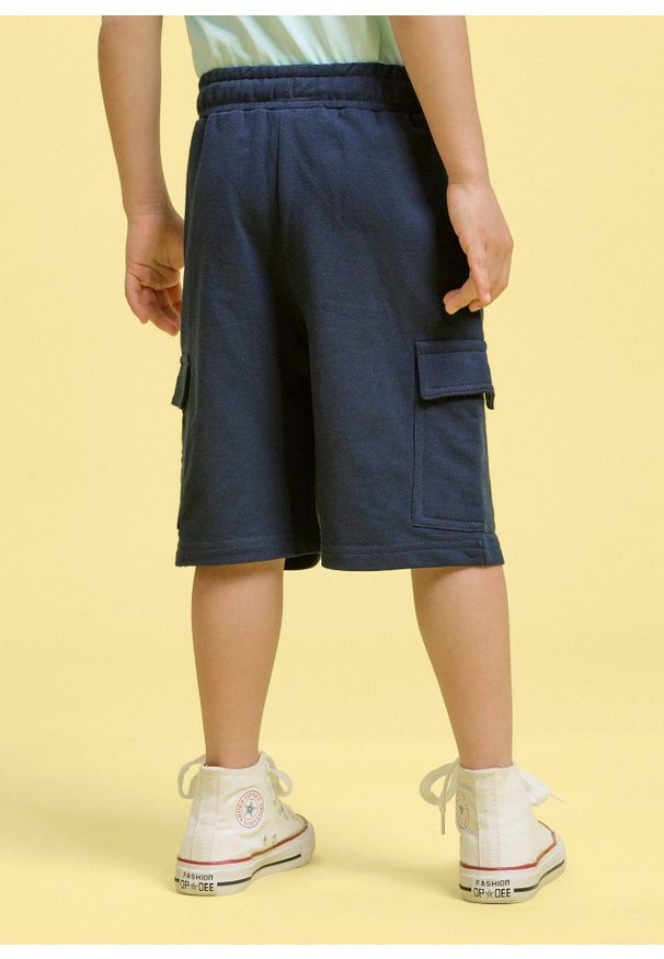 bonprix - Bermudy dresowe cargo z czystej bawełny organicznej. Kolor: niebieski. Materiał: dresówka, bawełna