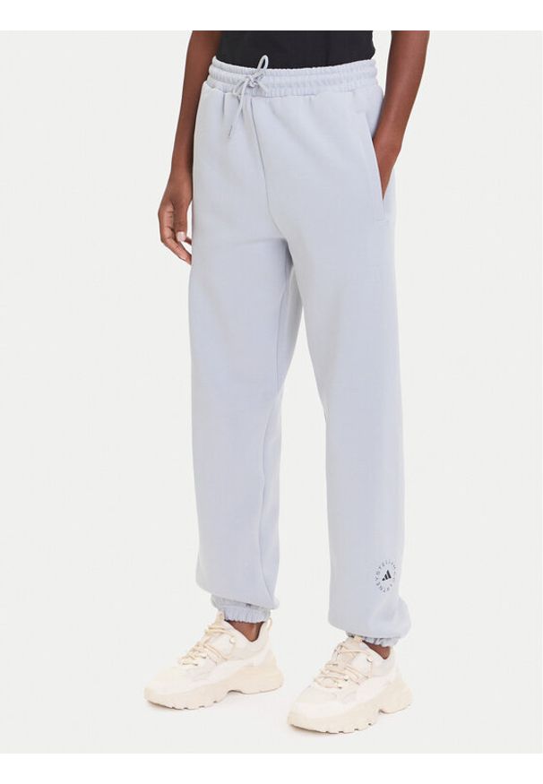 Adidas by Stella McCartney - adidas by Stella McCartney Spodnie dresowe JX6777 Szary Loose Fit. Kolor: szary. Materiał: bawełna