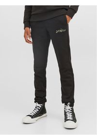 Jack&Jones Junior Spodnie dresowe 12237173 Czarny Comfort Fit. Kolor: czarny. Materiał: bawełna, dresówka, syntetyk #1