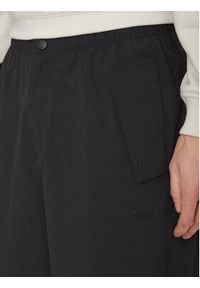 Adidas - adidas Spodnie materiałowe Premium Essentials Utility Parachute JD2111 Czarny Loose Fit. Kolor: czarny. Materiał: syntetyk #2